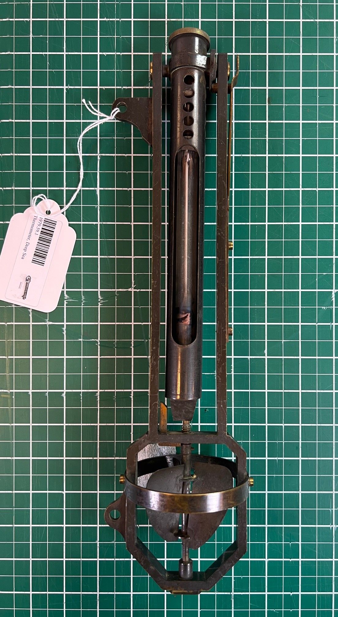 Negretti and Zambra deep sea thermometer in a metal case, from the 1890s