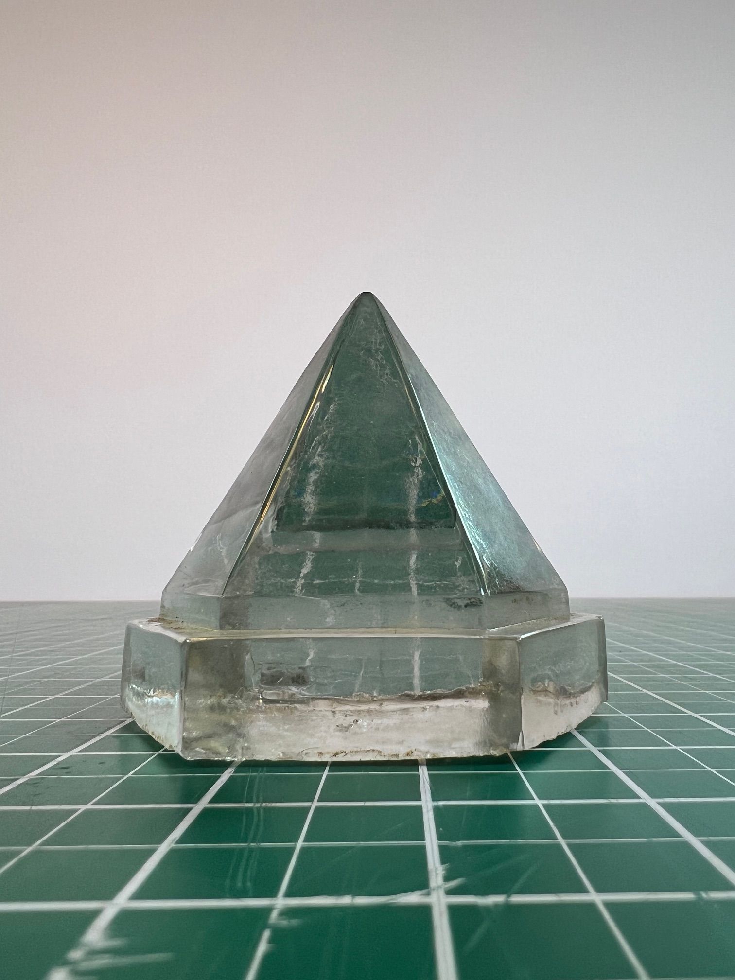 Glass deck prism in a deck light frame
